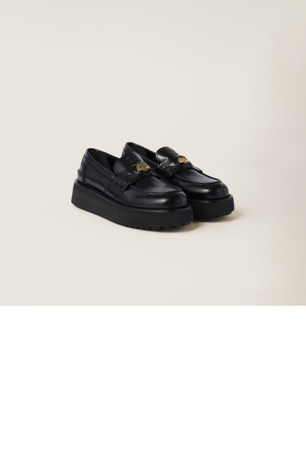 미우미우 브러쉬드 가죽 로퍼 5D175E