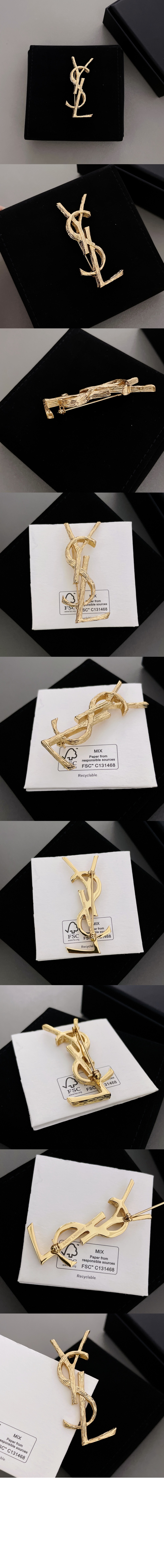 생로랑 메탈 소재의 CASSANDRE 브로치 748486